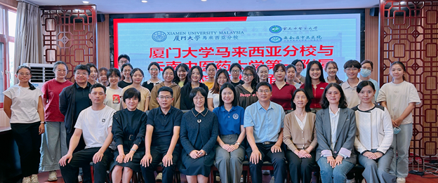 Group photo of the 25 interns with representatives from Yunnan CM University and the First Affiliated Hospital