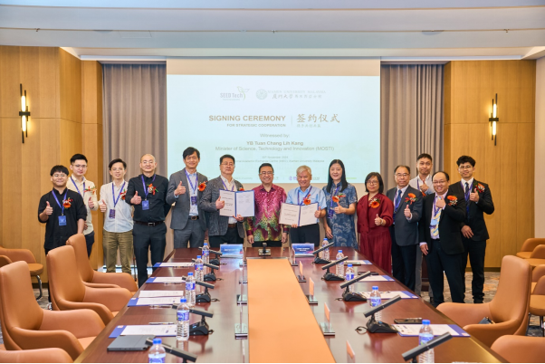 Group photo after the MoA signing ceremony